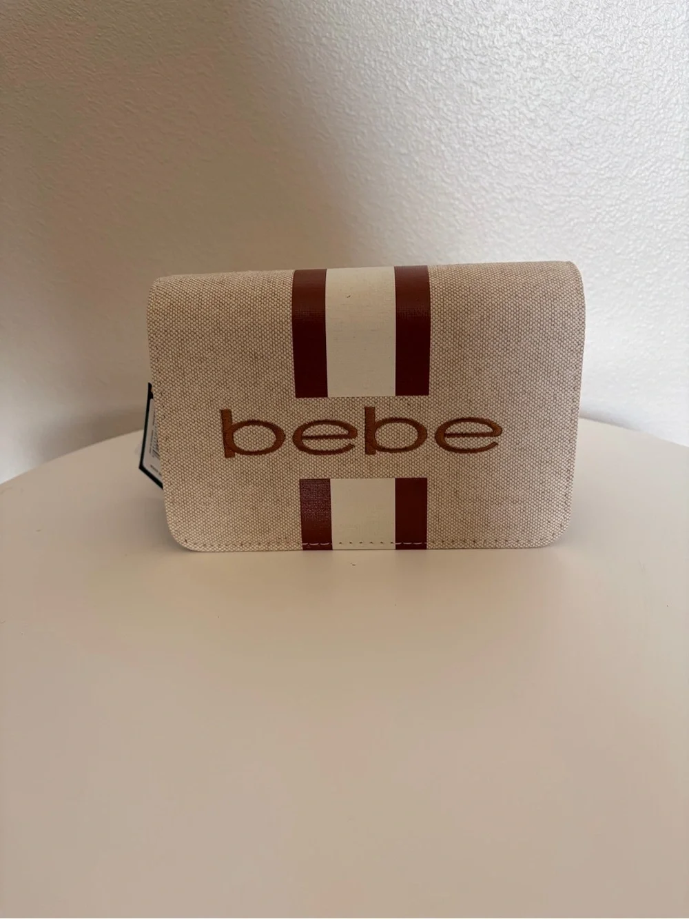 bebe Beige Clutch with Brown and Cream Stripe Accent