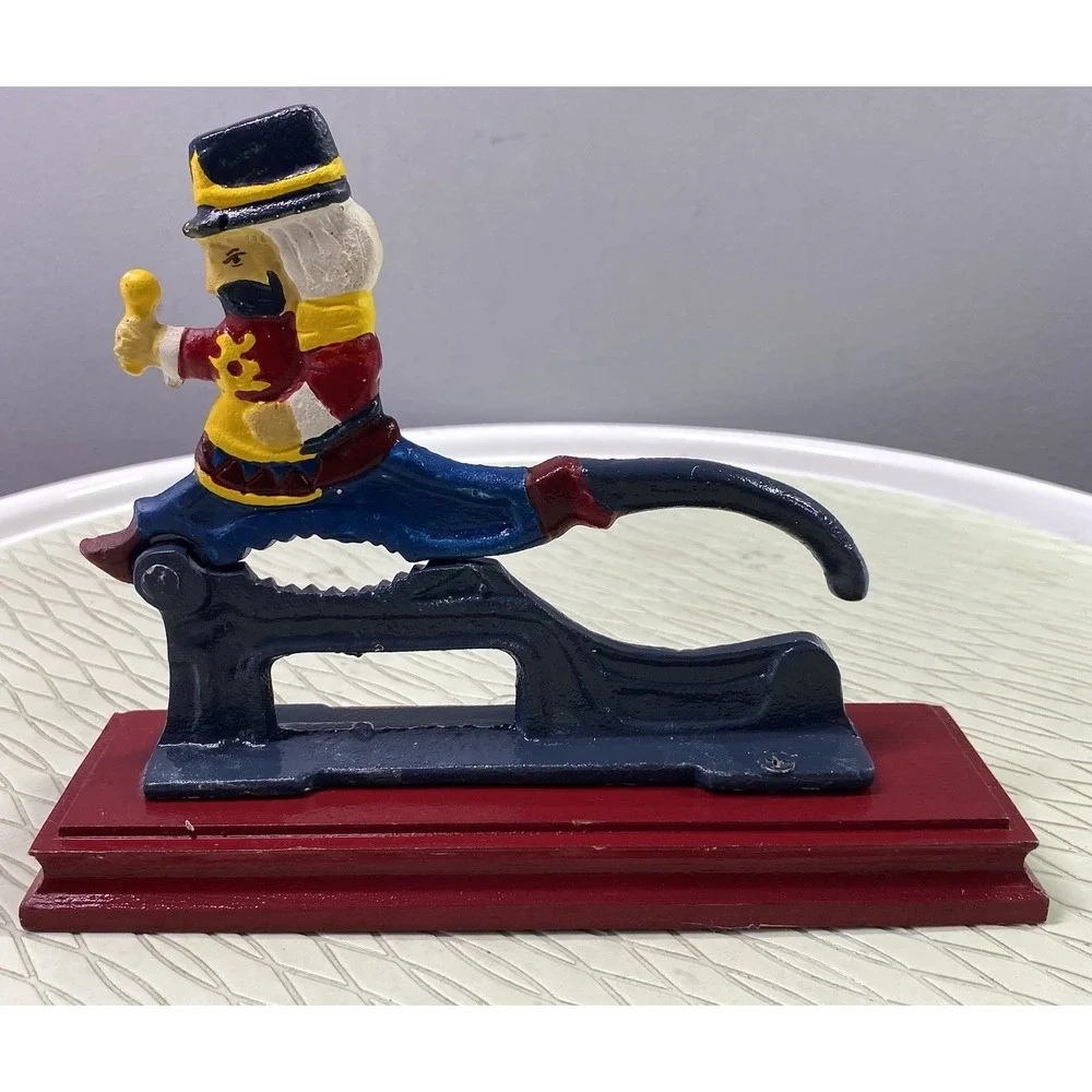 Vintage Cast Iron Nut Cracker Painted‎ on Mounted Wood Base Christmas 6x7.5x2