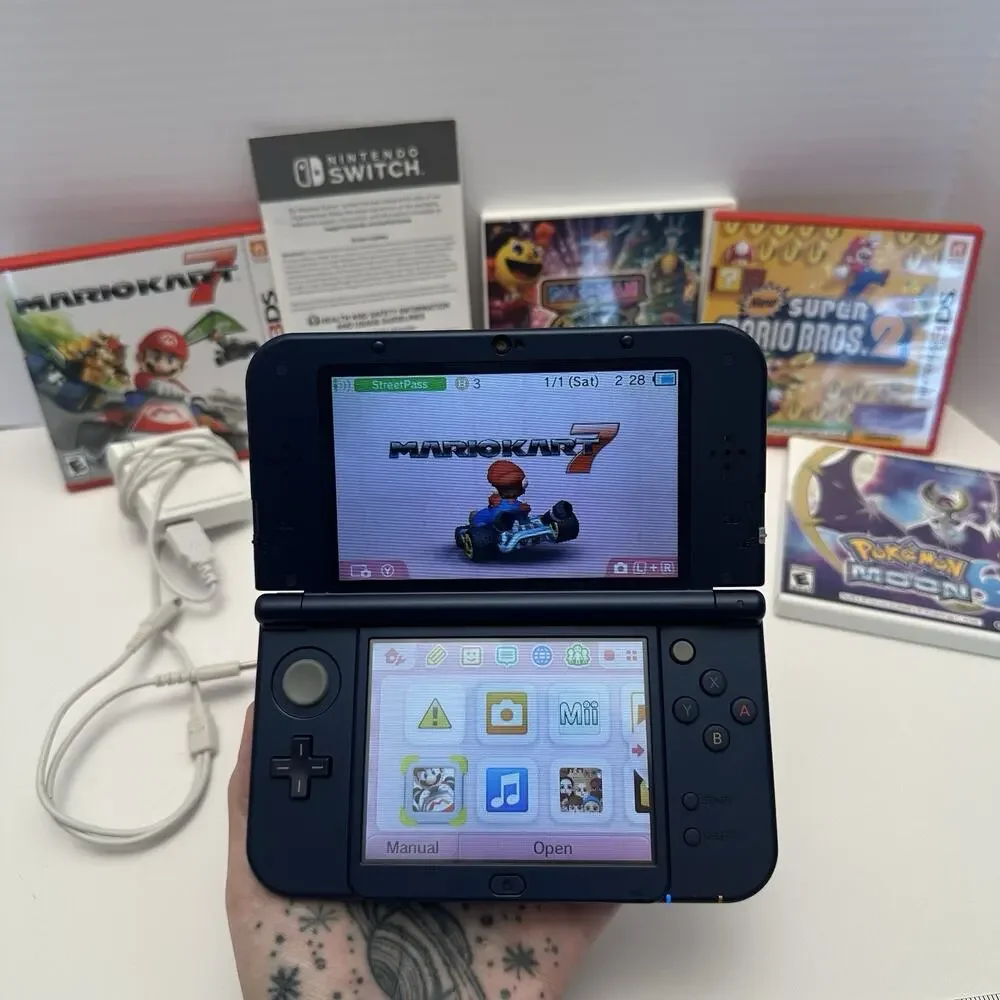 Nintendo New 3DS XL Purple Galaxy Edition - Charger, Stylus, Manual & 4 Games
