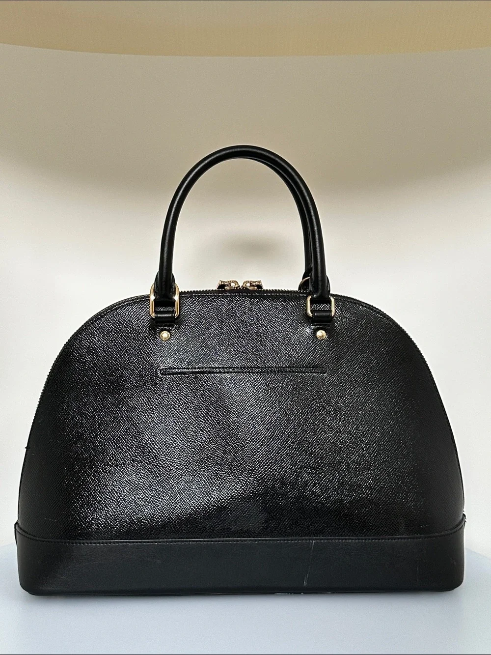 Coach sleek dome