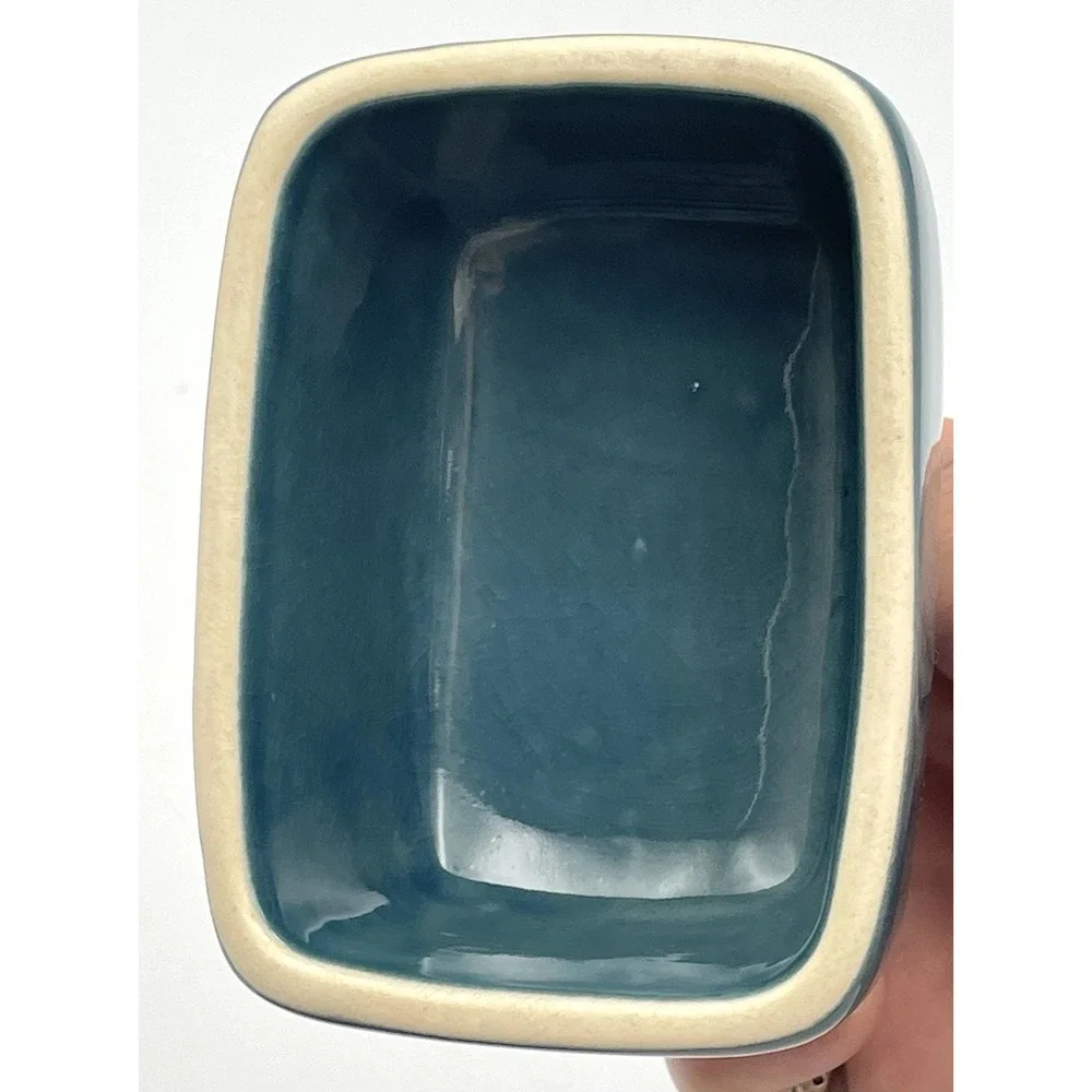 Threshold stoneware covered
