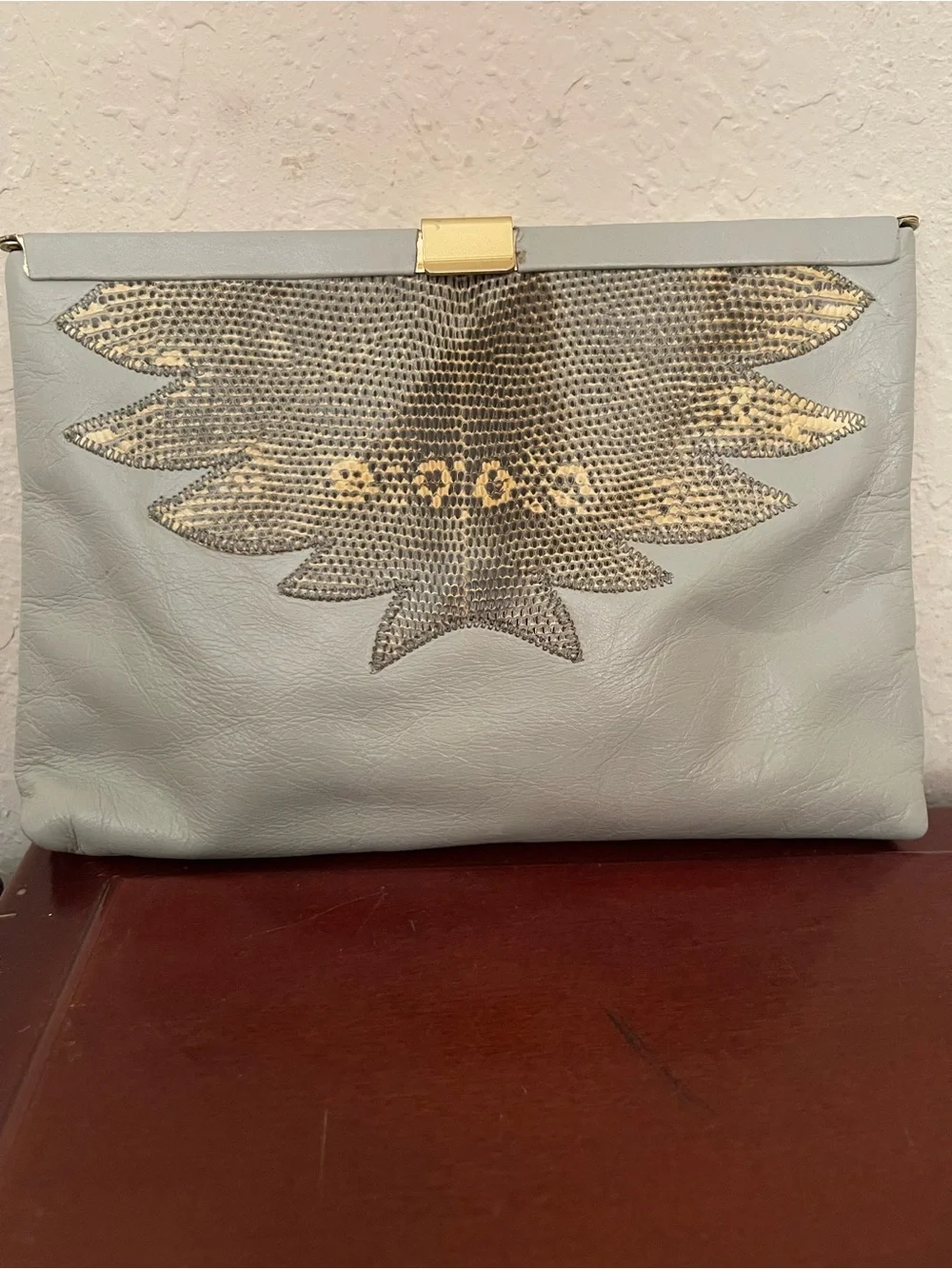 Light Blue Leather Clutch by; Palizzio with Snake-Skin Accent