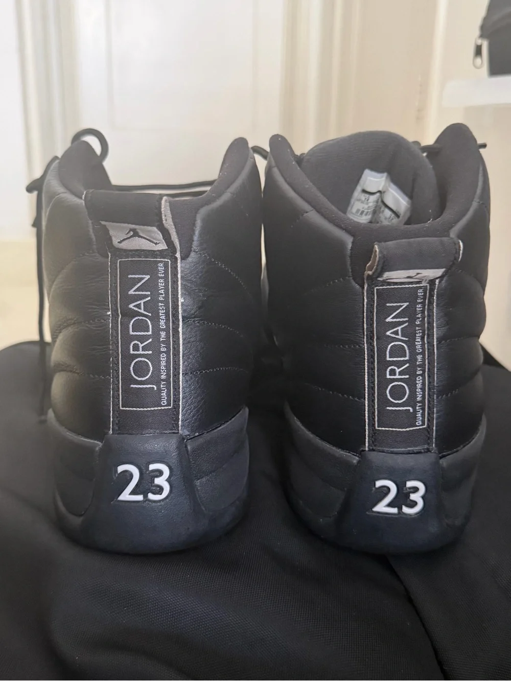 Jordan Men's Black Sneakers with Gold Accents
