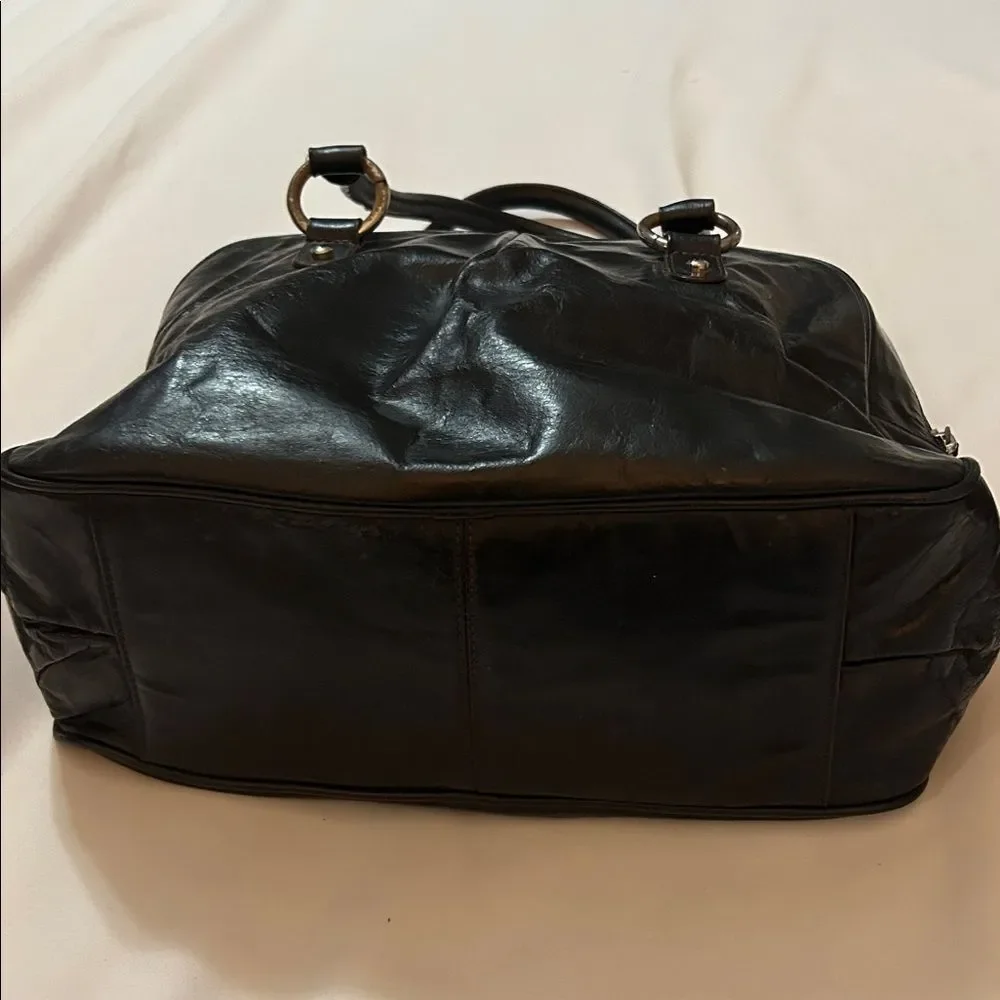 Etienne Aigner black zip 11”h