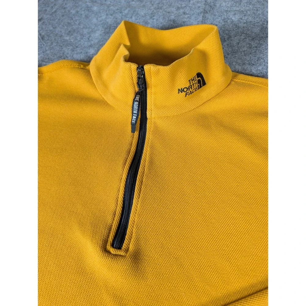 The North Face yellow zip