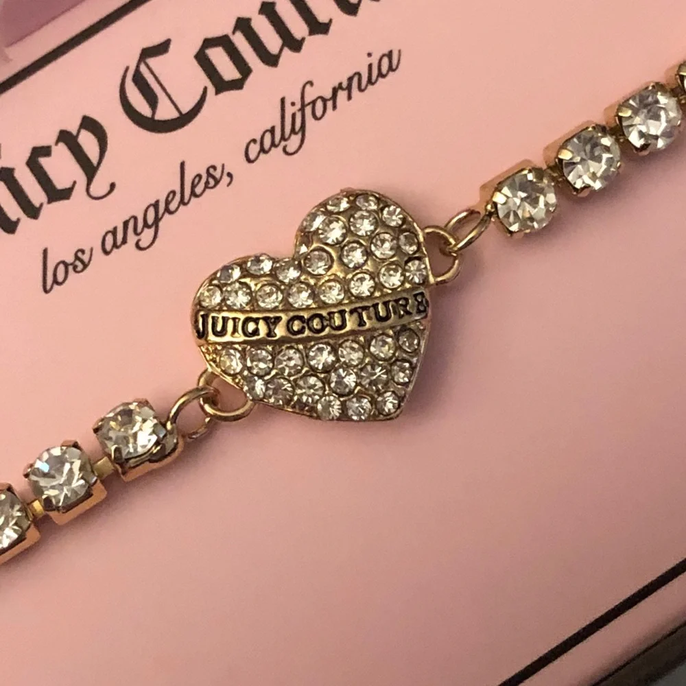 Juicy Couture gold tone