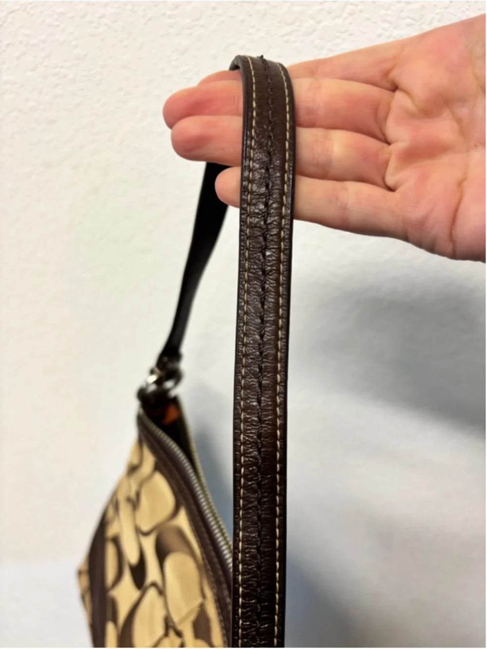 Coach personally purchased