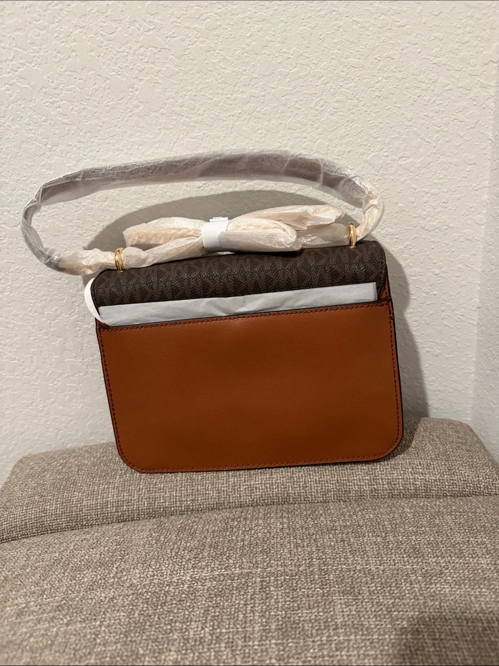 Michael Kors logo carry