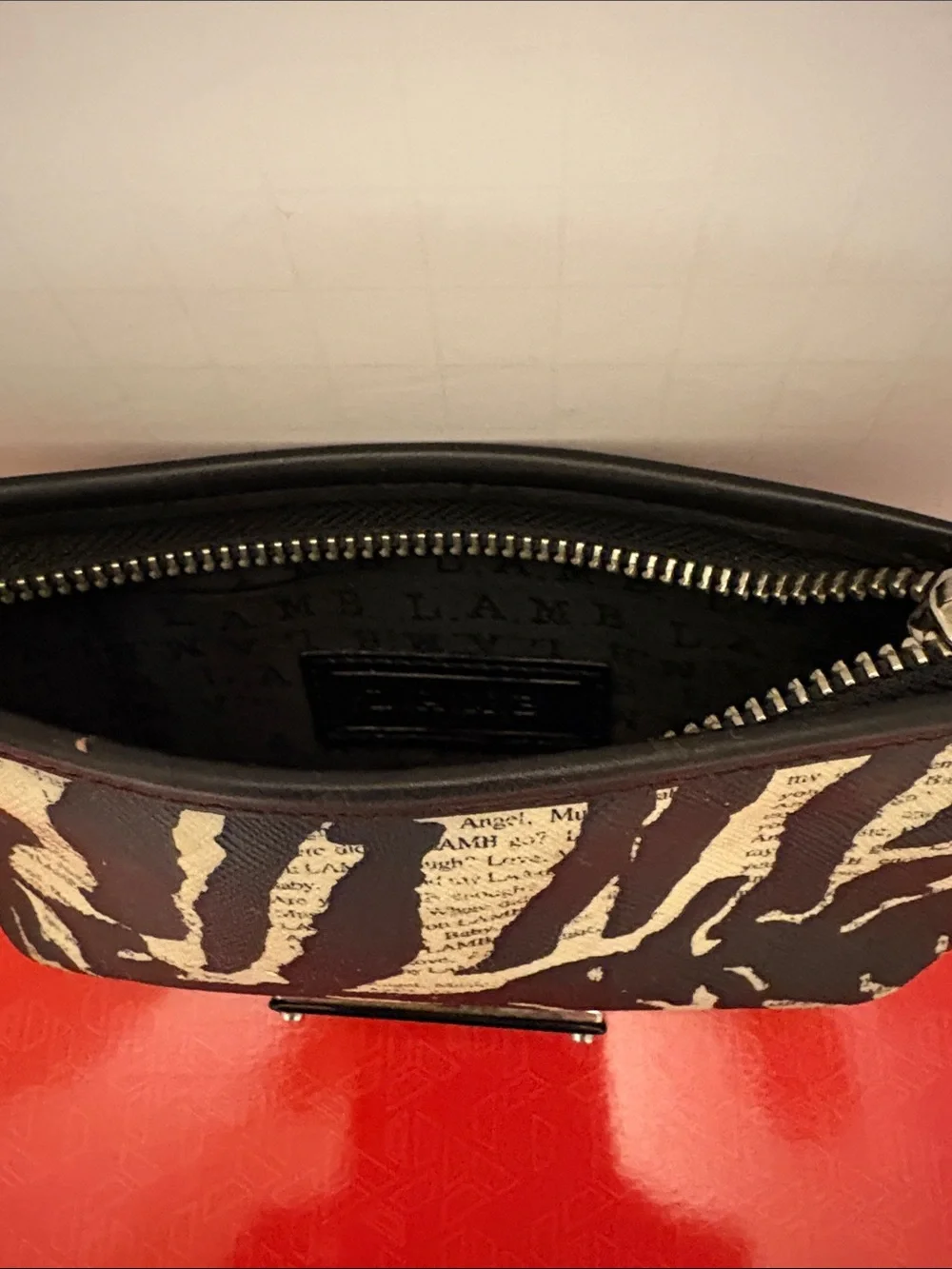 L.A.M.B. clutch featuring