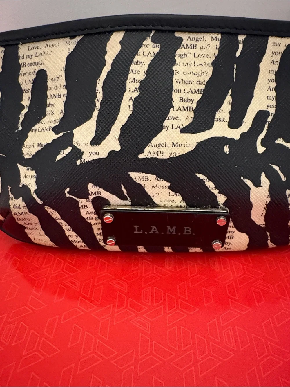 L.A.M.B. clutch featuring
