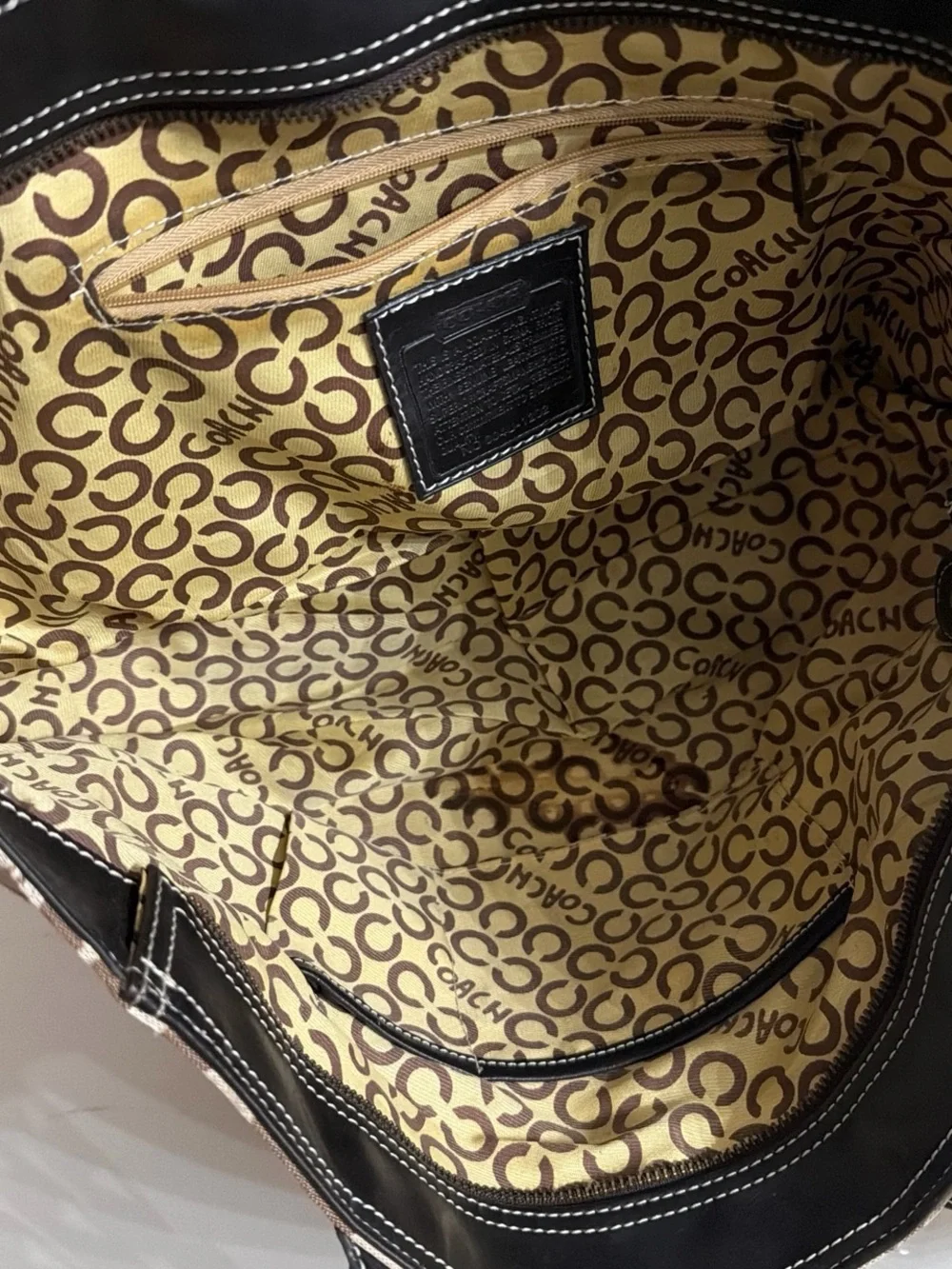 Coach pattern leather