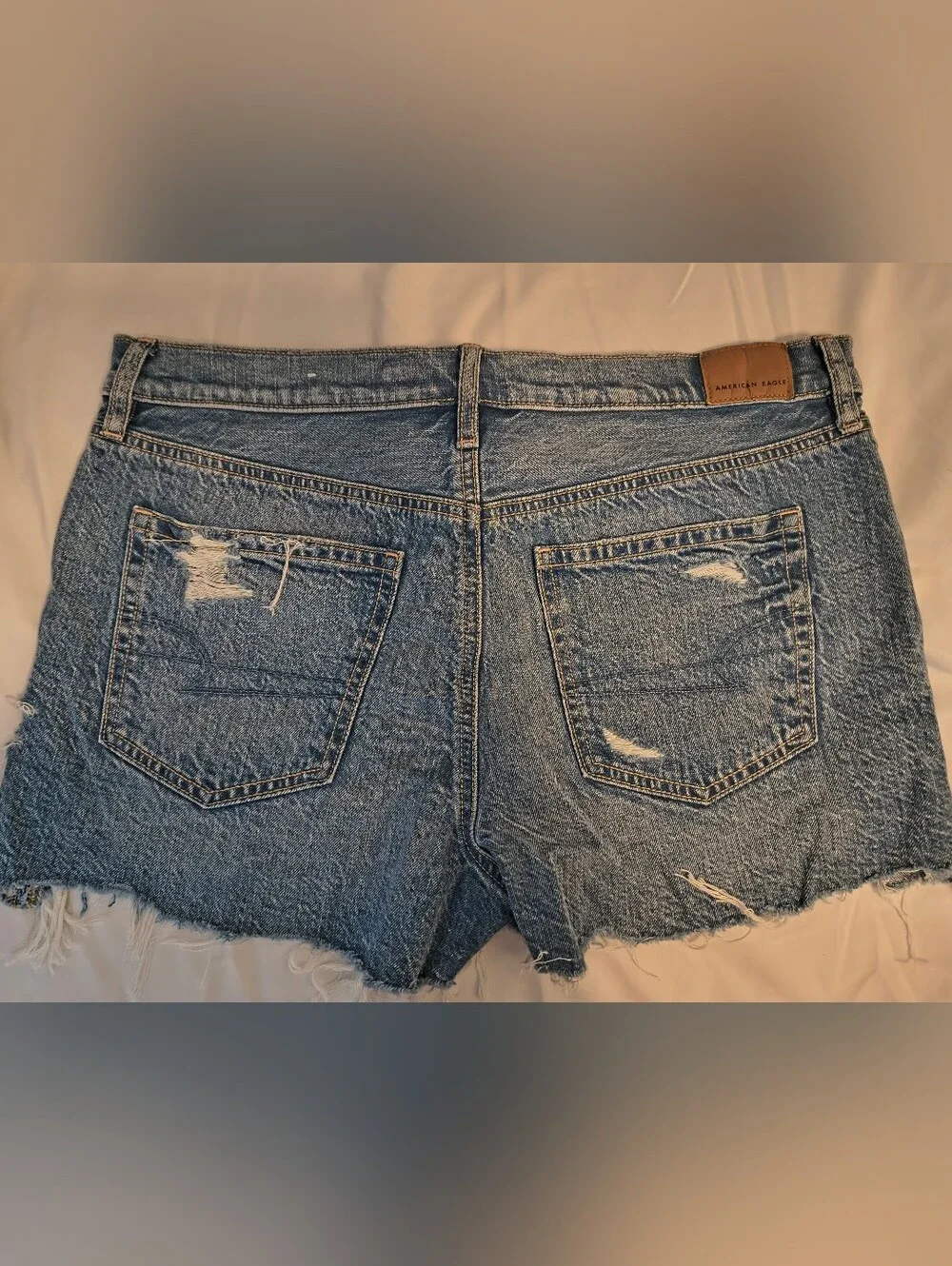 American Eagle Outfitters Distressed Blue Denim Jean Shorts with Orange Underlay