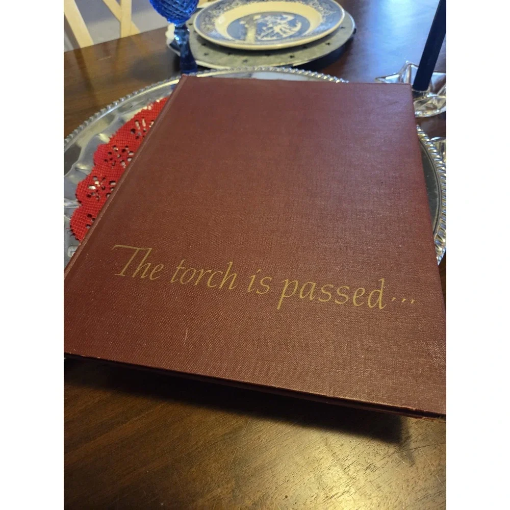 vintage 1963 hardcover book titled The Torch President John F Kennedy
