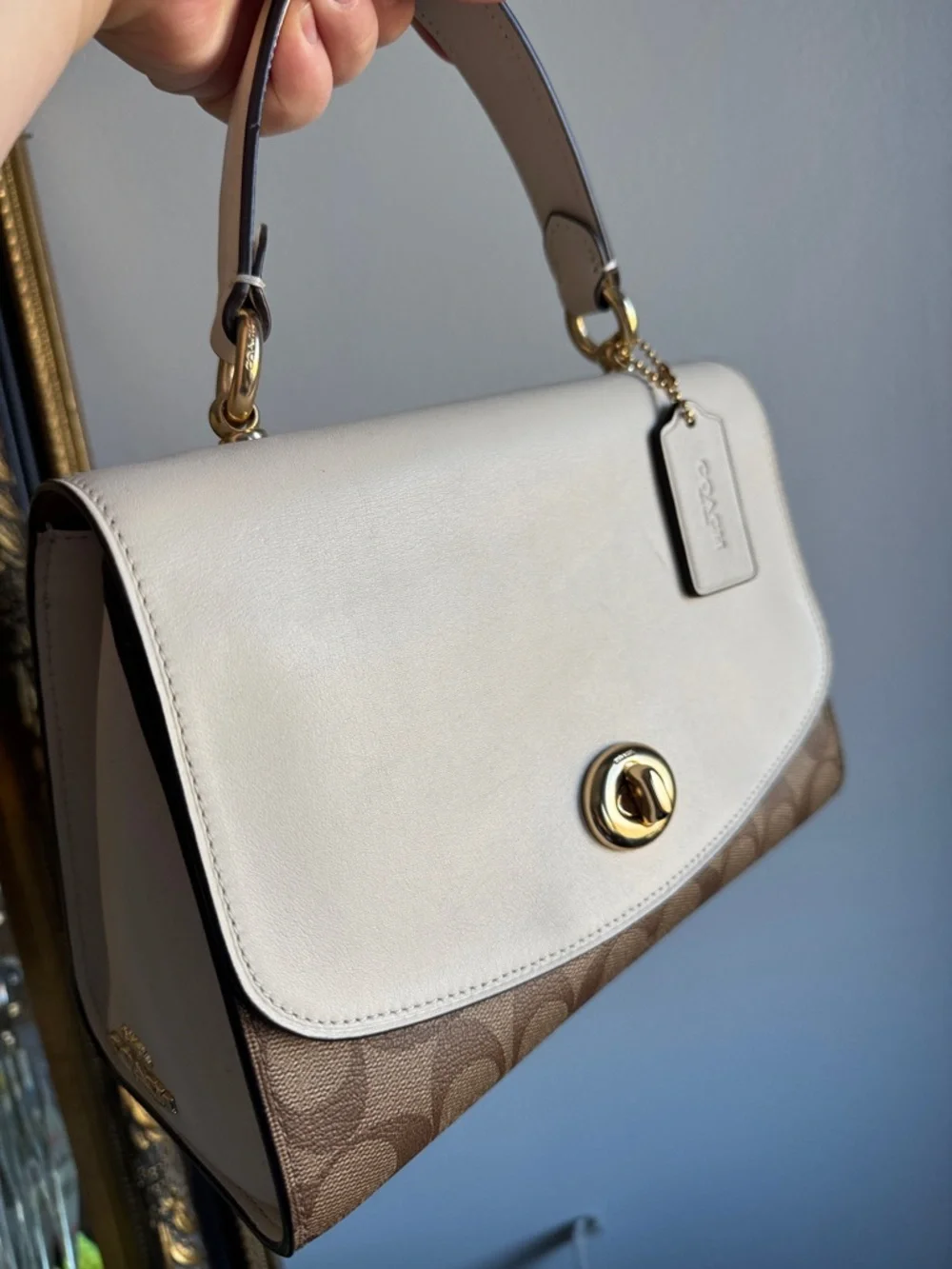 Coach satchel cream