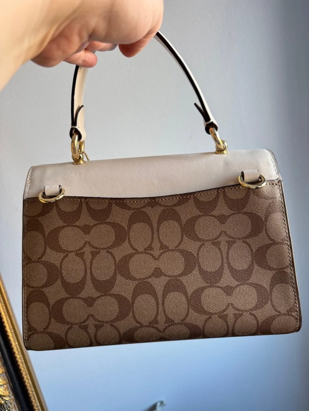 Coach satchel cream