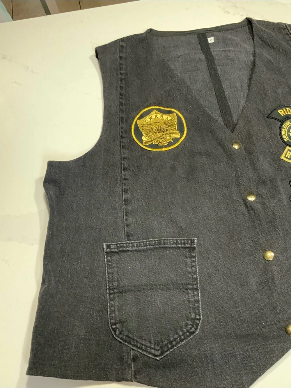 Source Unknown gold vest