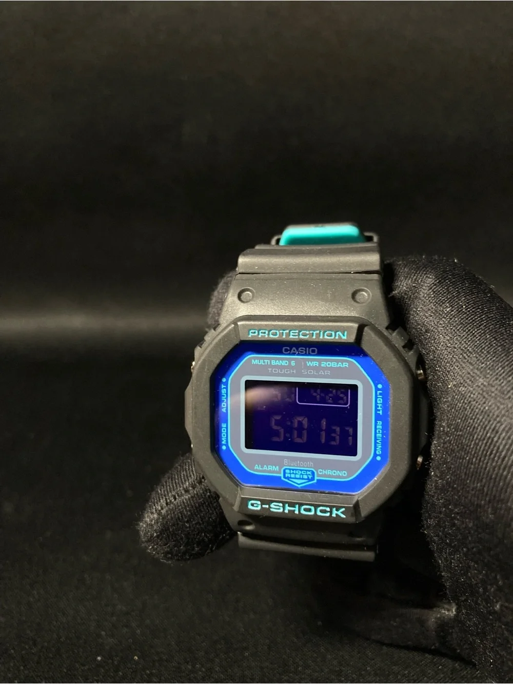 Teal and Black G Shock Dw5600