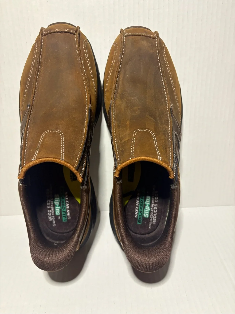 Skechers men’s hands