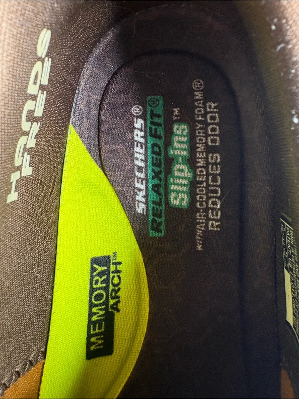 Skechers men’s hands