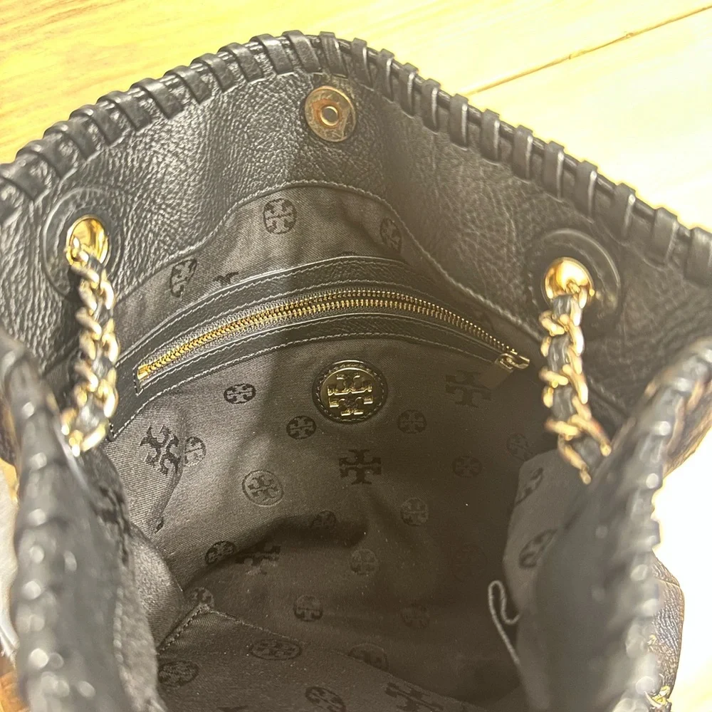Tory Burch reposhing this