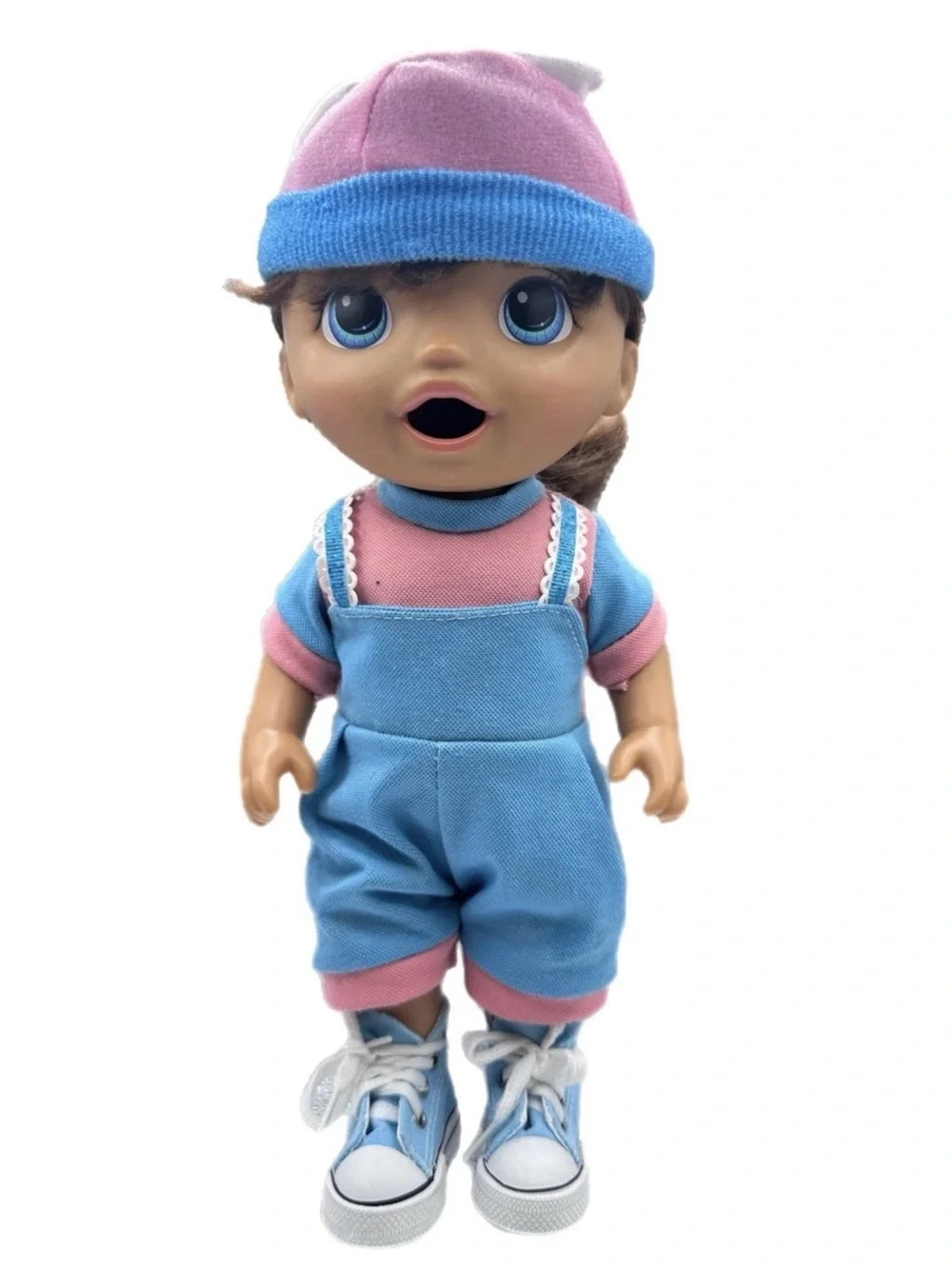 Dress-Up Baby Doll with Pink Floral Skirt and Blue Accessories