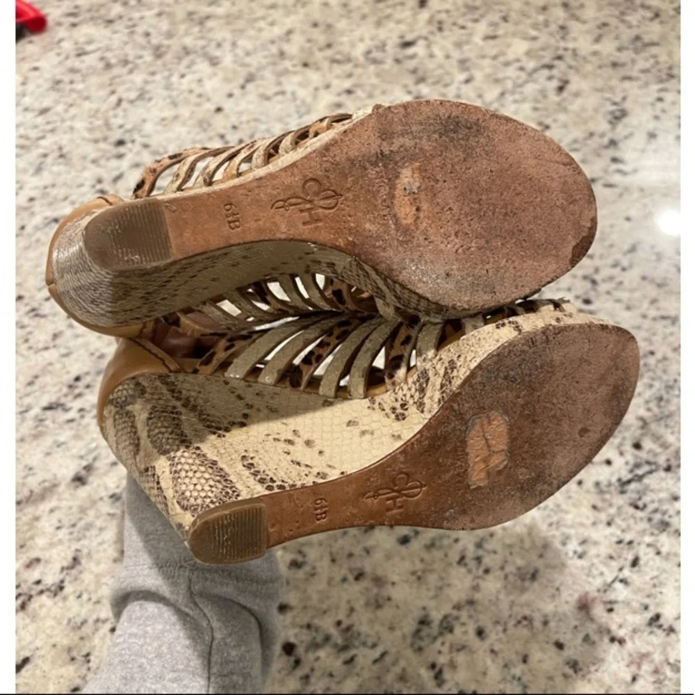 Cole Haan inches one