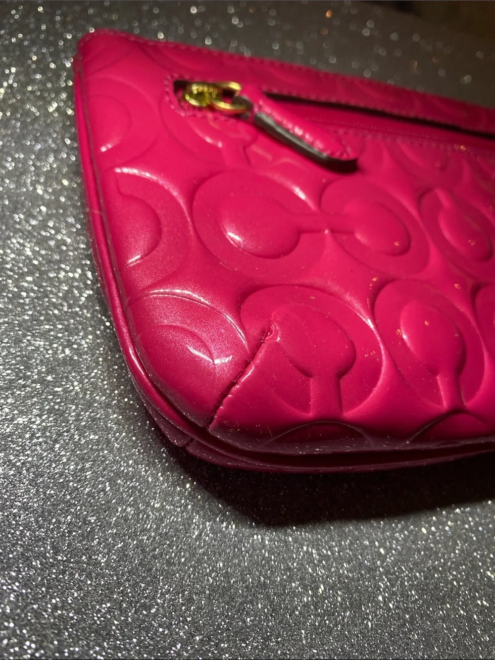 Coach embossed patent