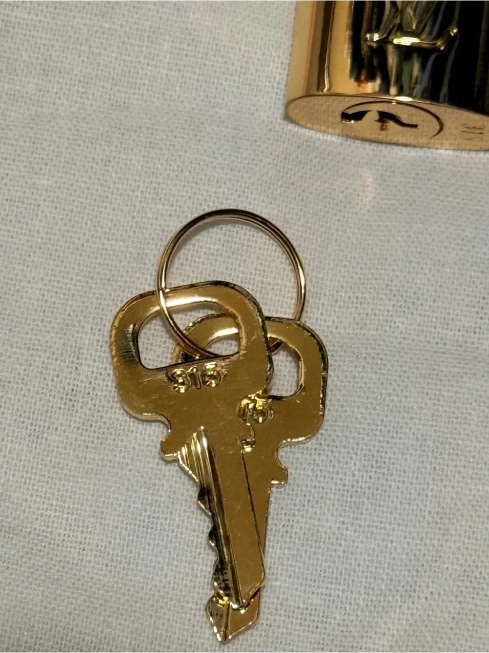 Louis Vuitton polished gold