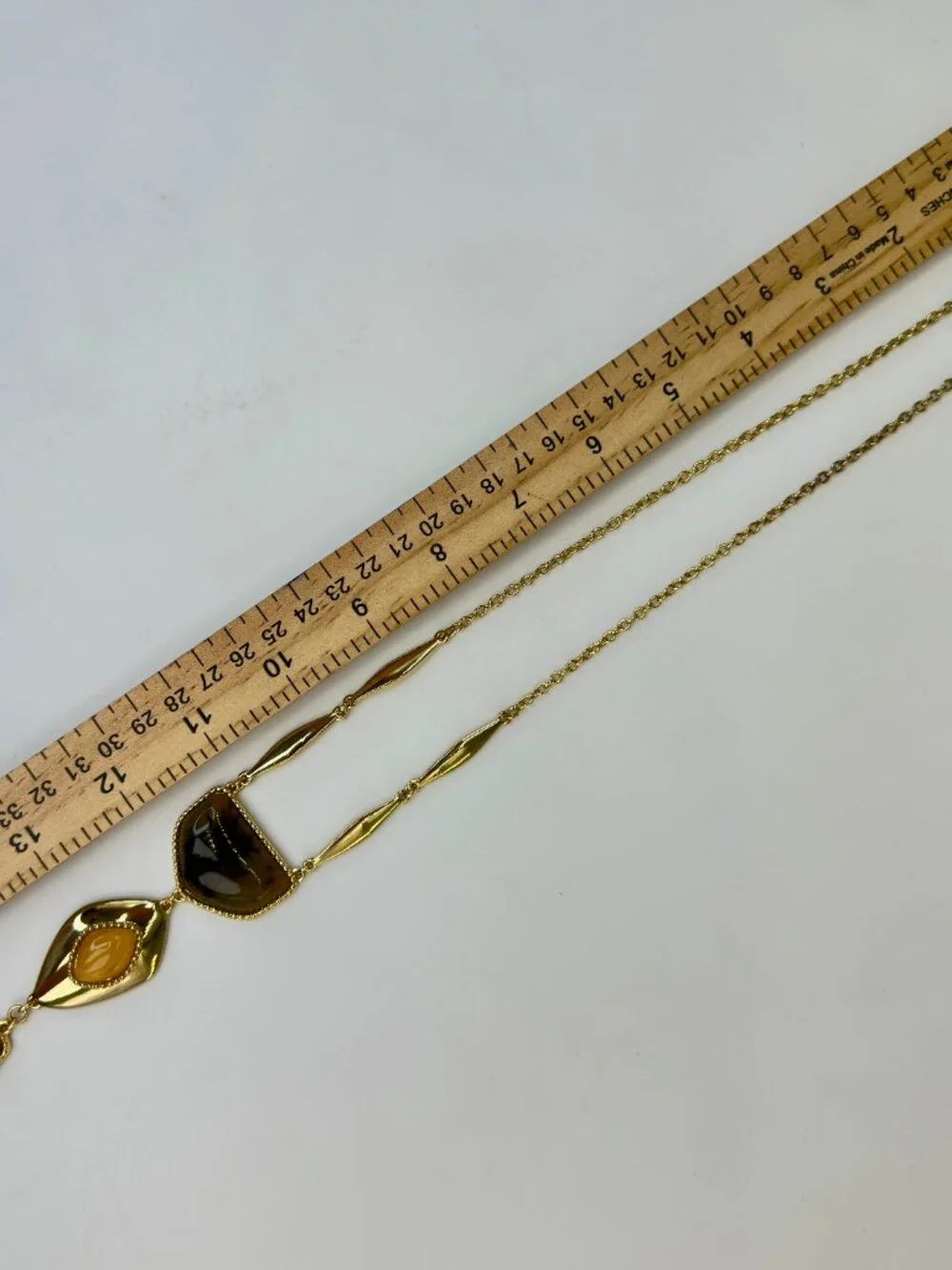 Charming Charlie piece details gold