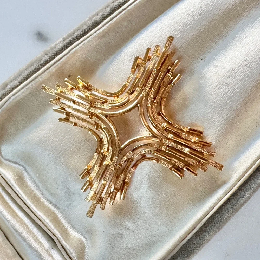 Trifari striking gold