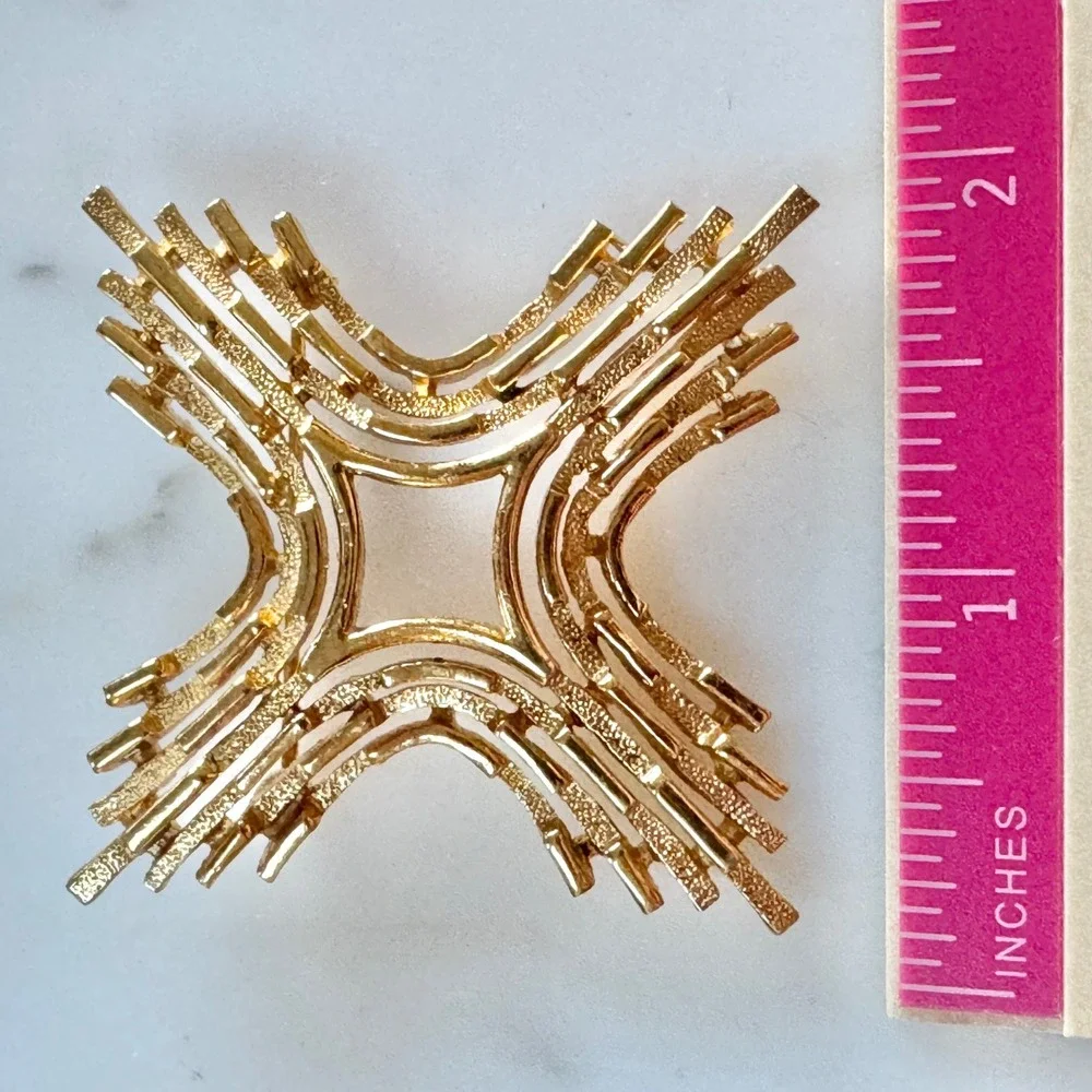 Trifari striking gold
