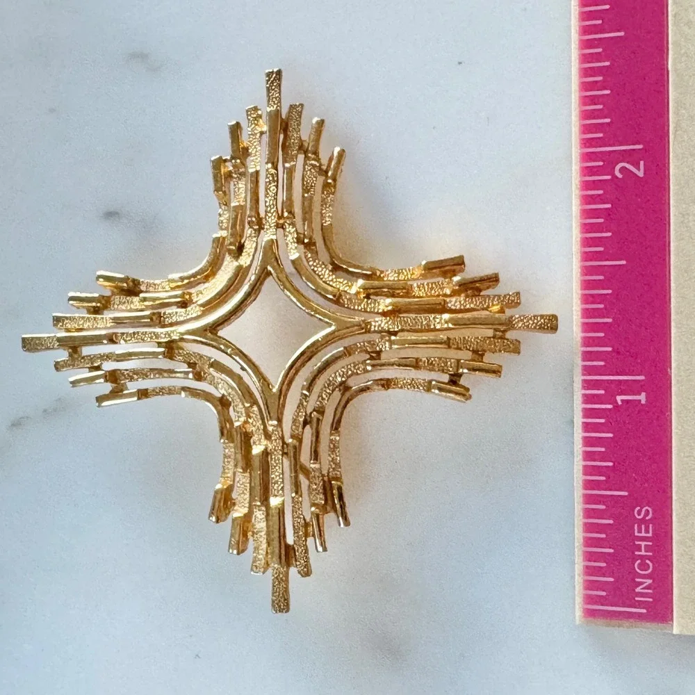 Trifari striking gold