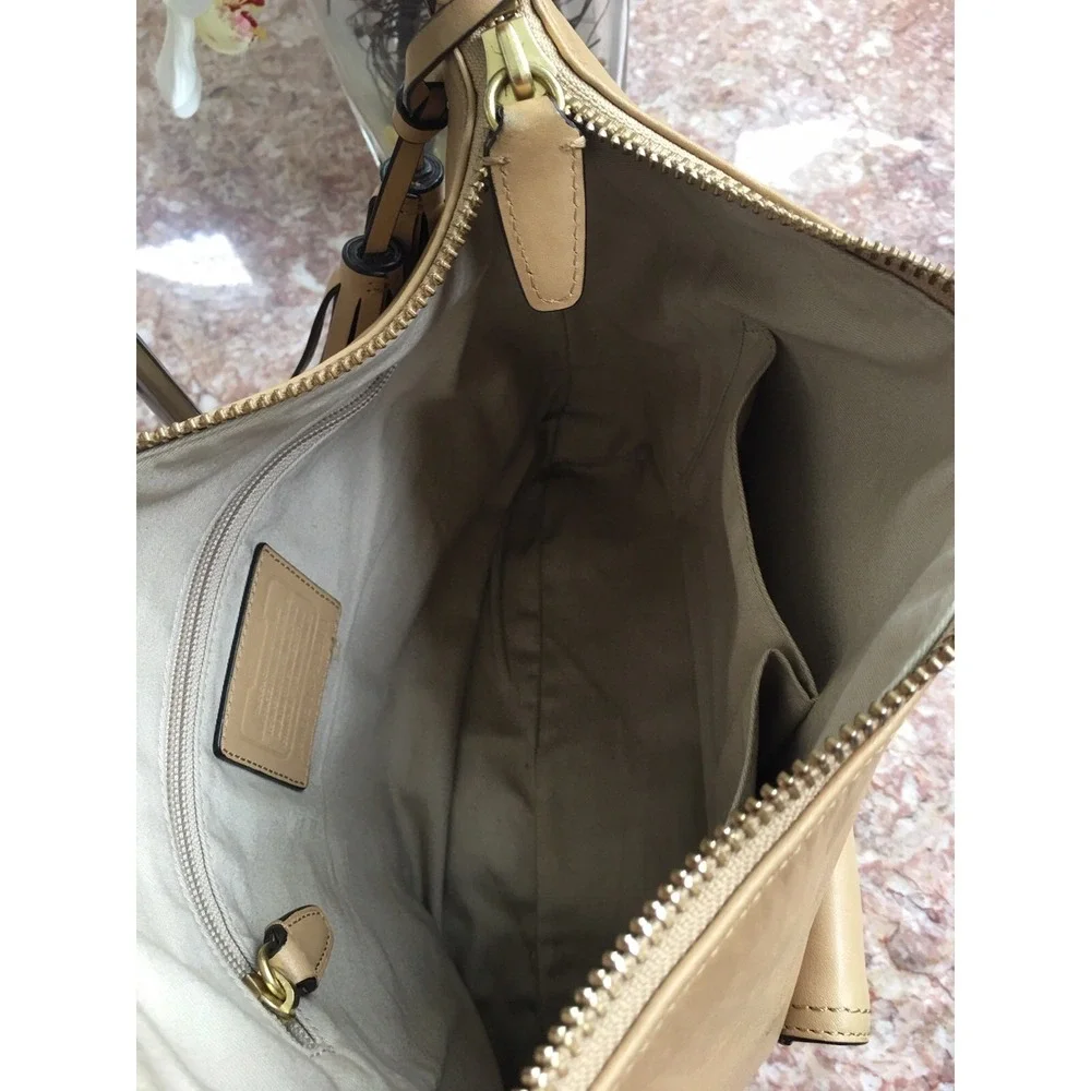 Coach legacy tan