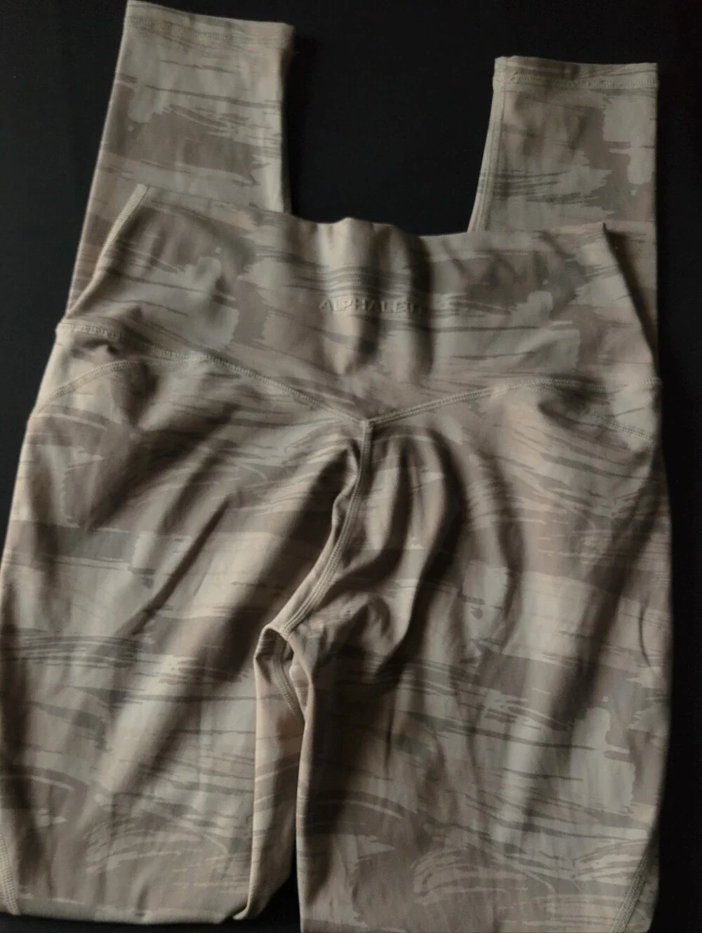 Alphalete beige cross