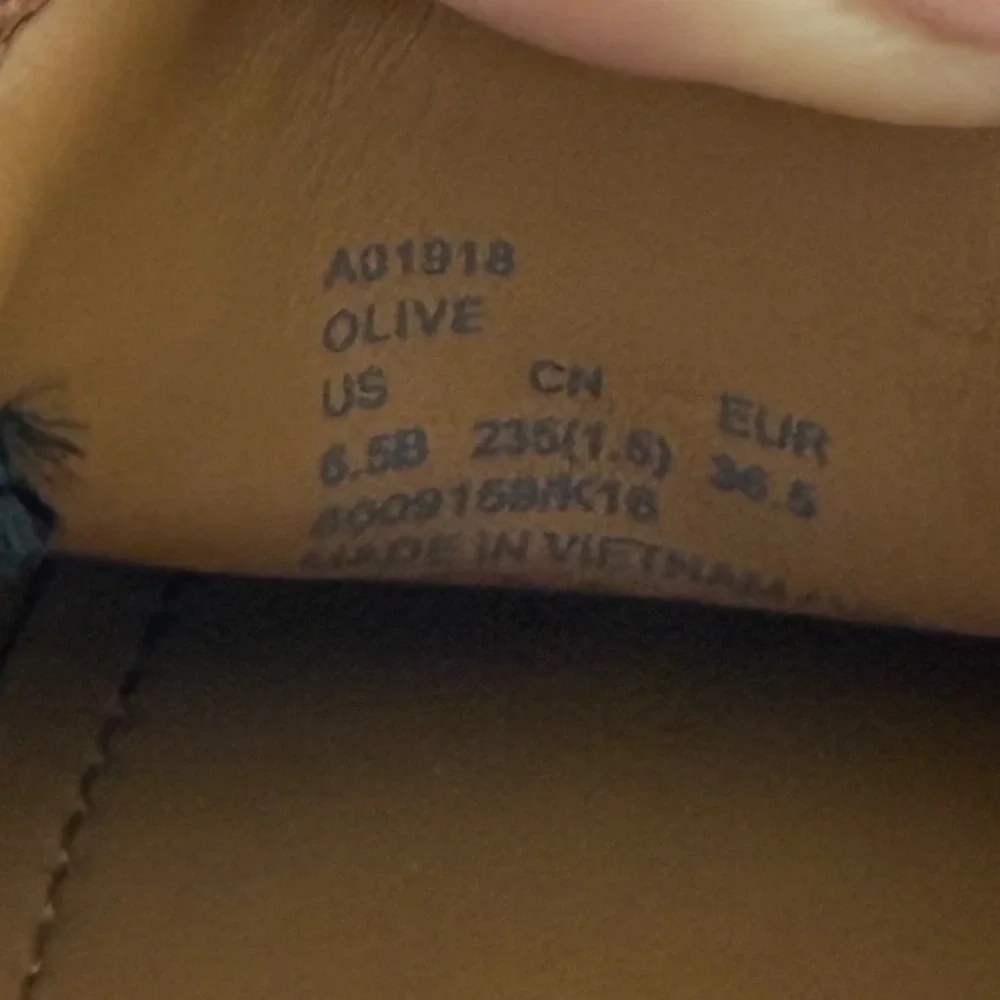 Coach olive signature