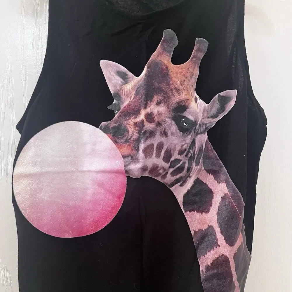 H&M giraffe blowing