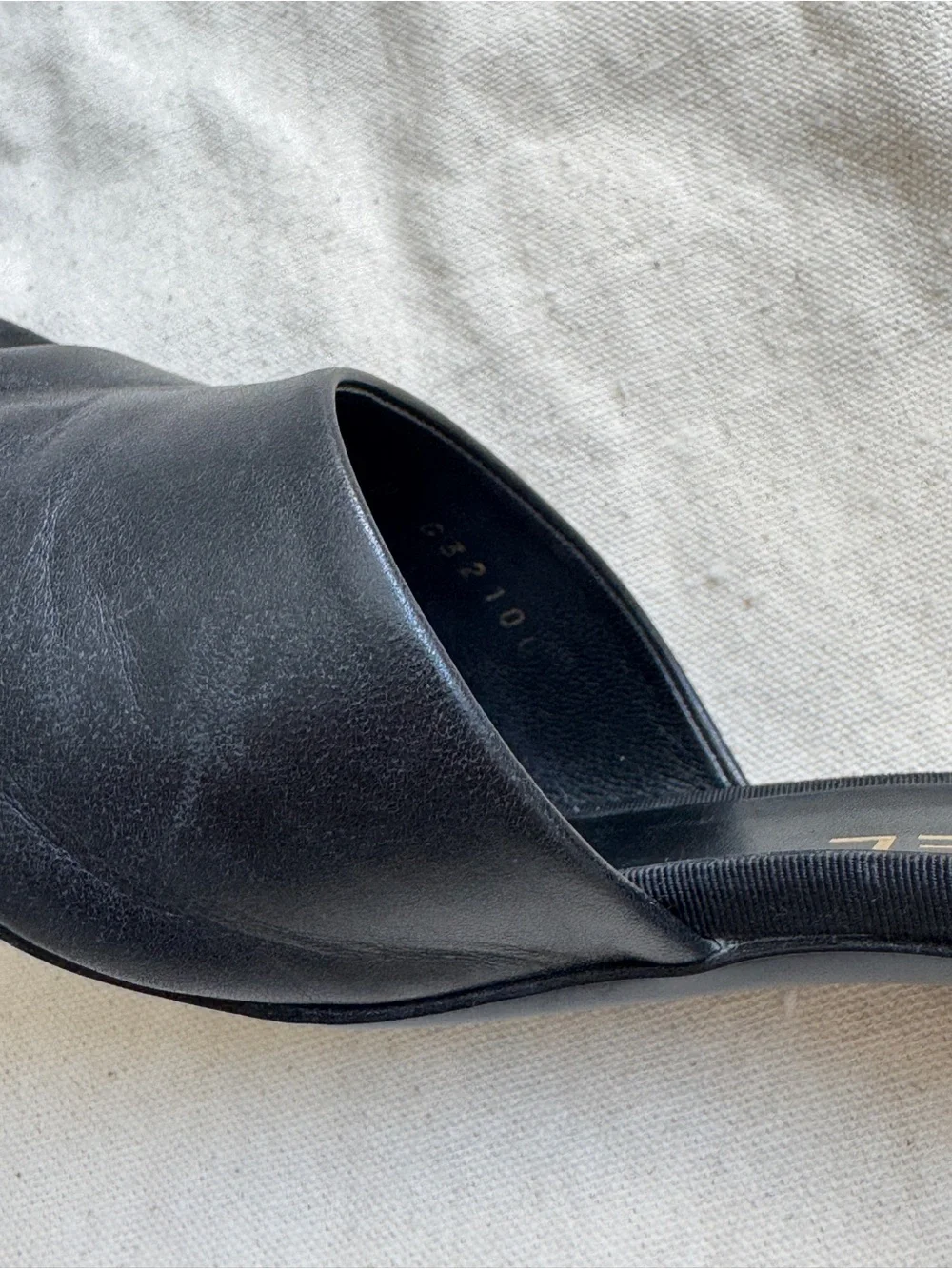 CHANEL leather mules