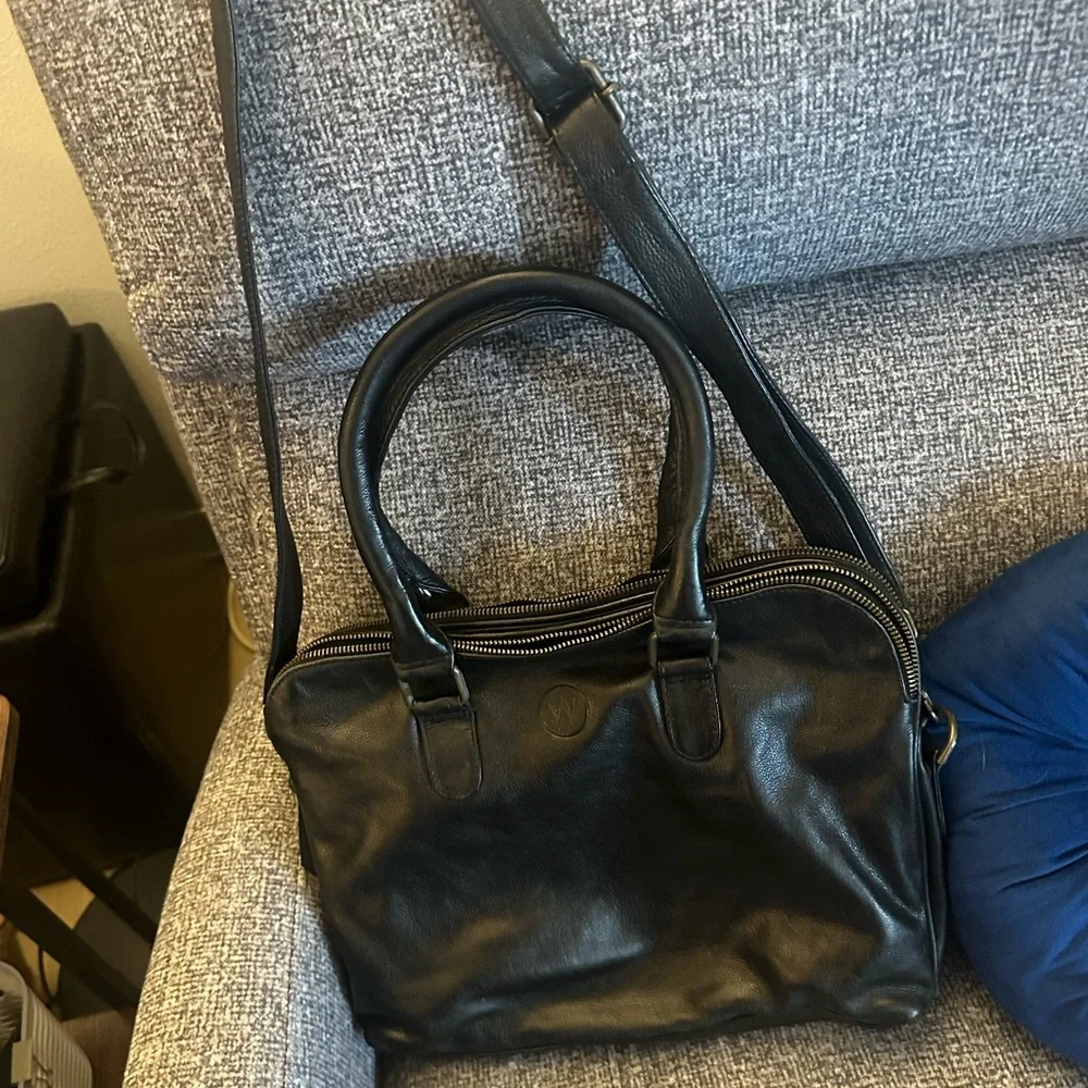 Wanderers Travel Co brand black