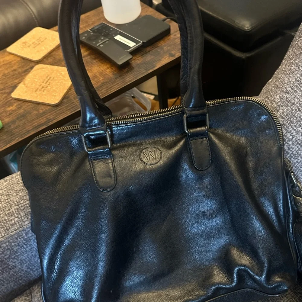 Wanderers Travel Co brand black