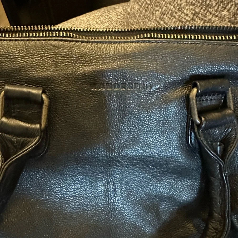 Wanderers Travel Co brand black
