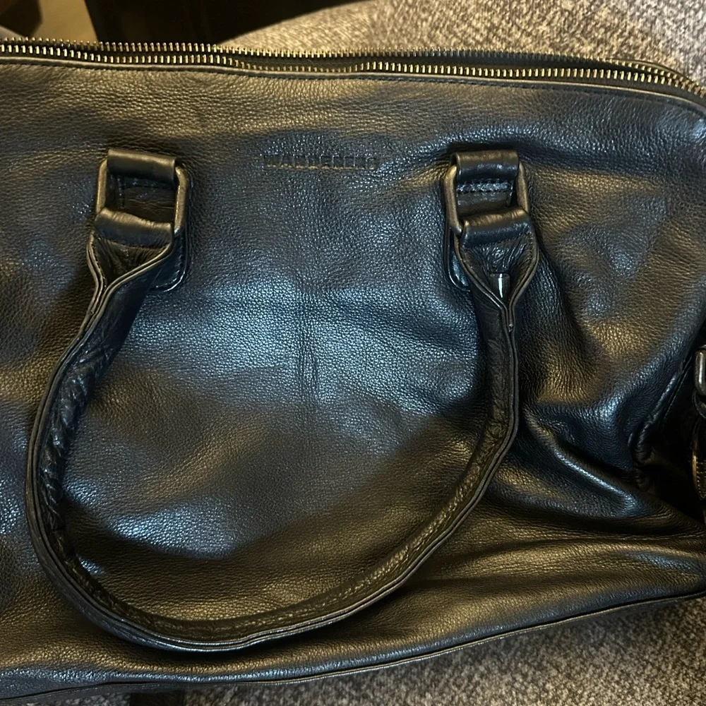 Wanderers Travel Co brand black