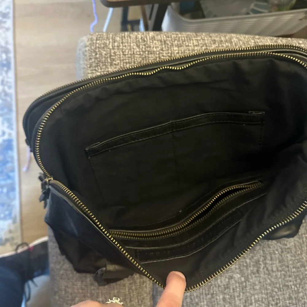 Wanderers Travel Co brand black