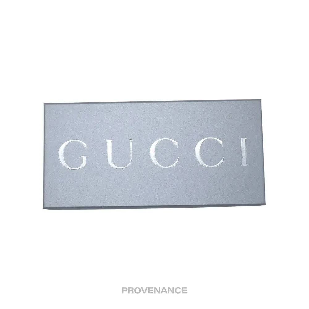 Gucci playing gold wallet