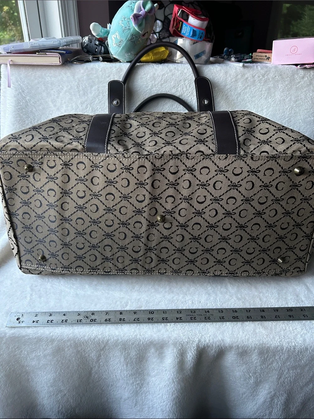 CIAO! 22” duffle bag with faux leather handles buckle