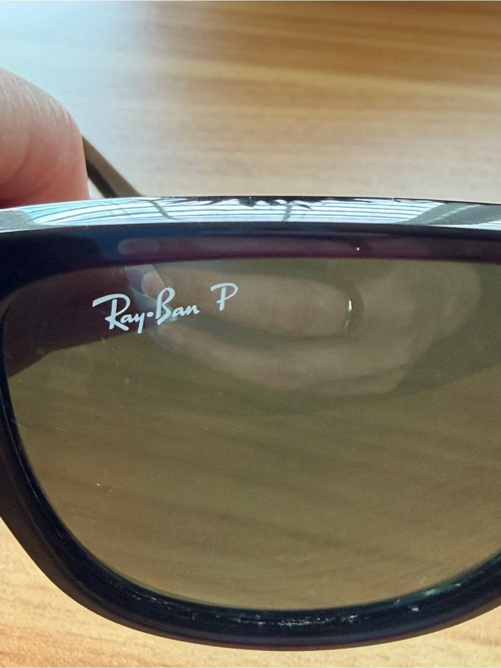 Ray-Ban cleaning green