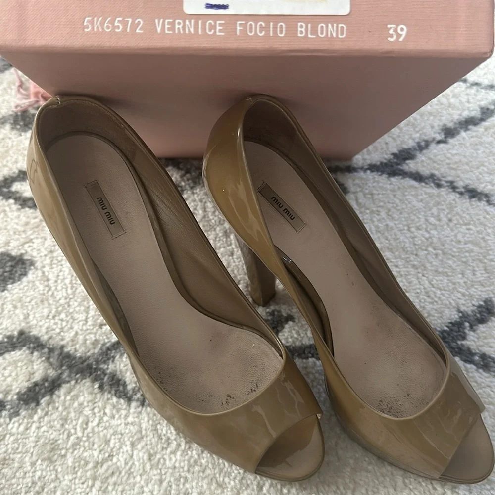 Miu Miu size ensuring or