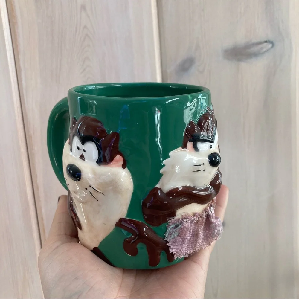 Warner Bros. green mug