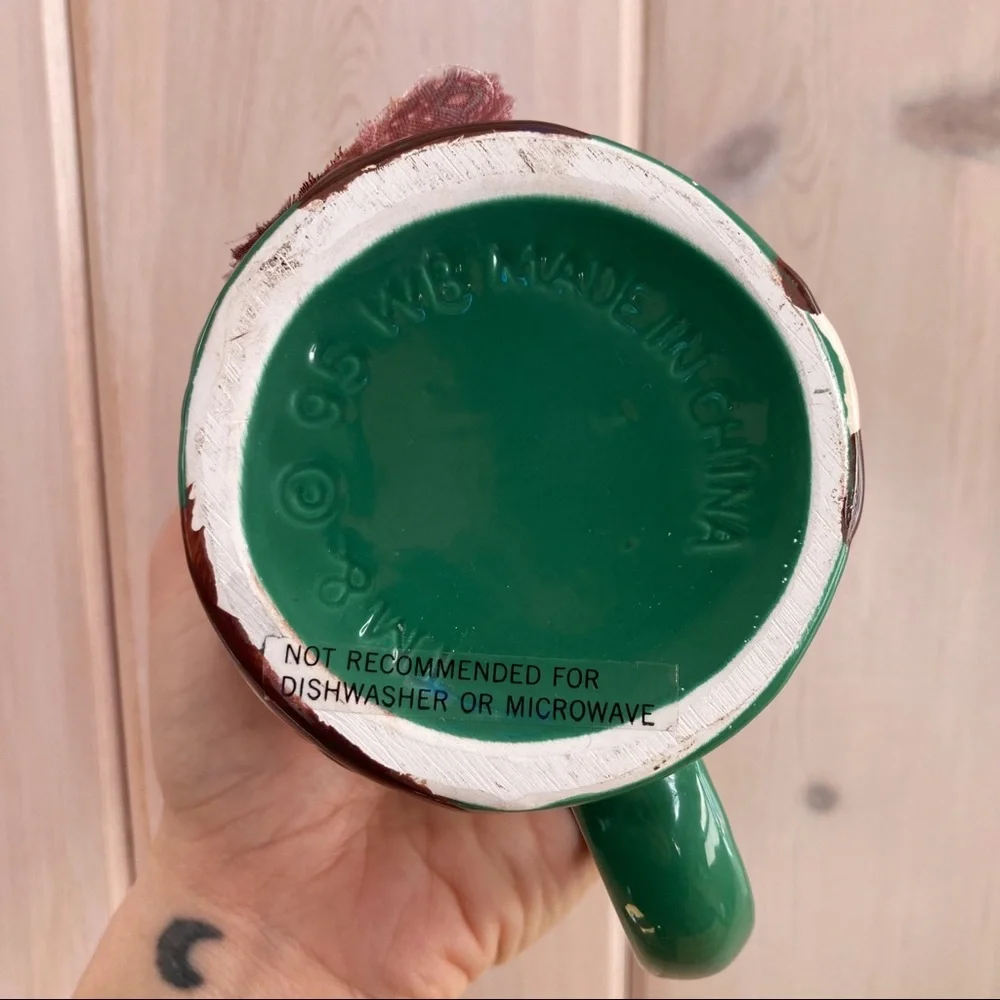 Warner Bros. green mug