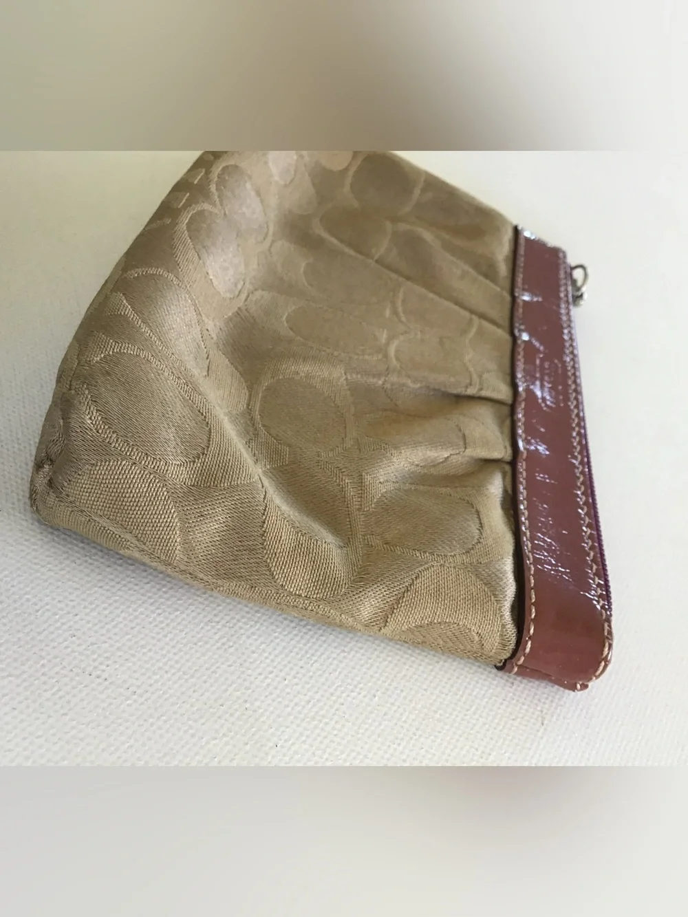 Coach features brand