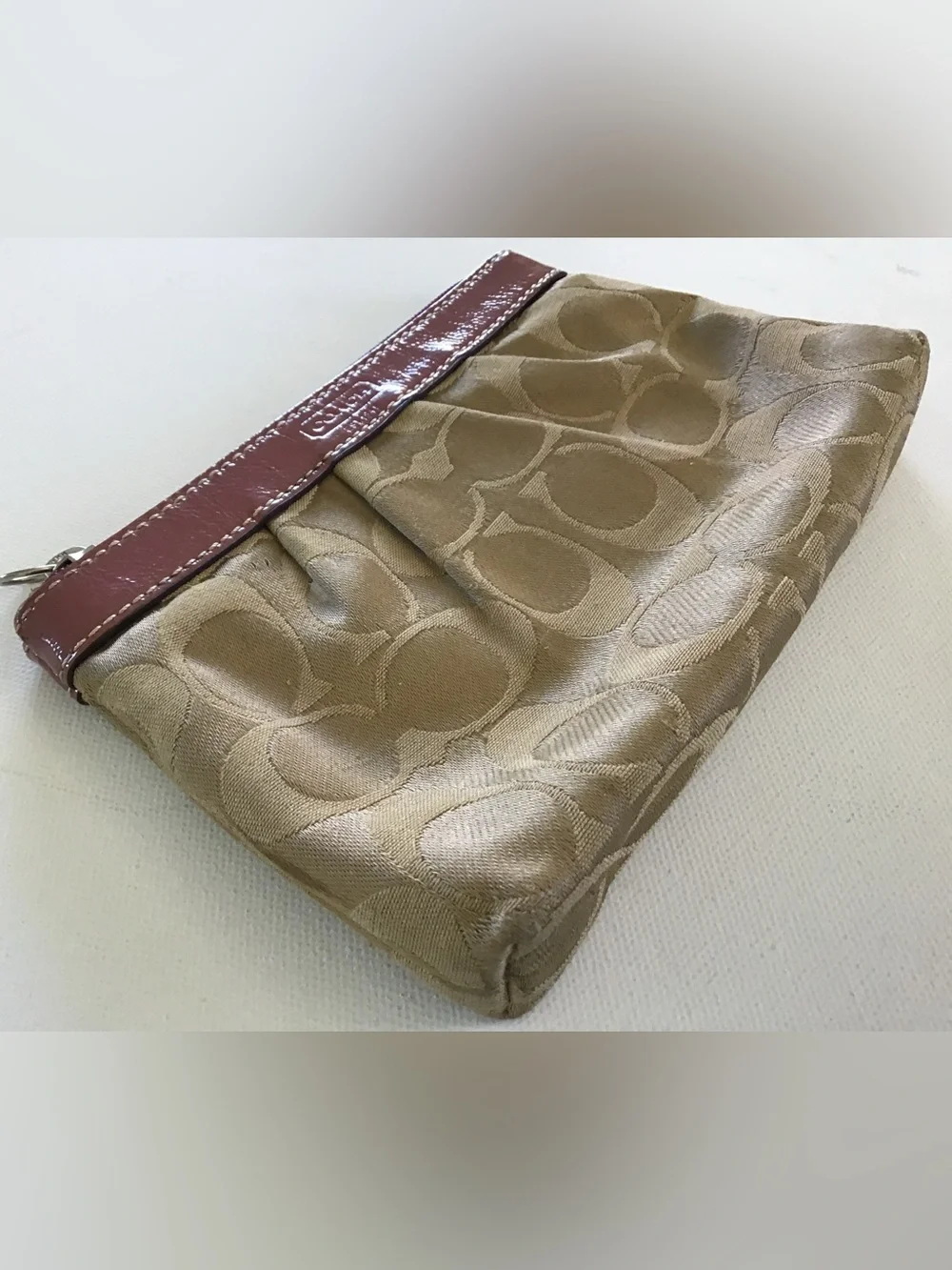 Coach features brand